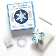eco kids snowflake ornament kit with packaging, cookie cutter, and mixing bowl on a white background