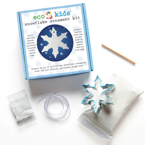 eco kids snowflake ornament kit with packaging, cookie cutter, and mixing bowl on a white background