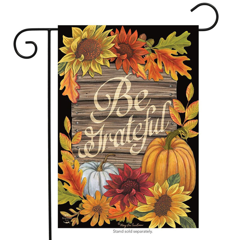 Decorative garden flag with autumnal design featuring sunflowers, pumpkins, and the text 'Be Grateful'.