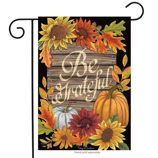 Decorative garden flag with autumnal design featuring sunflowers, pumpkins, and the text 'Be Grateful'.