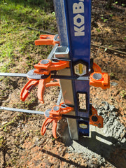 example of how to use clamps and levels to install the station pole plumb