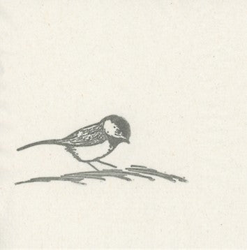 Simple linocut print of a chickadee on a branch 