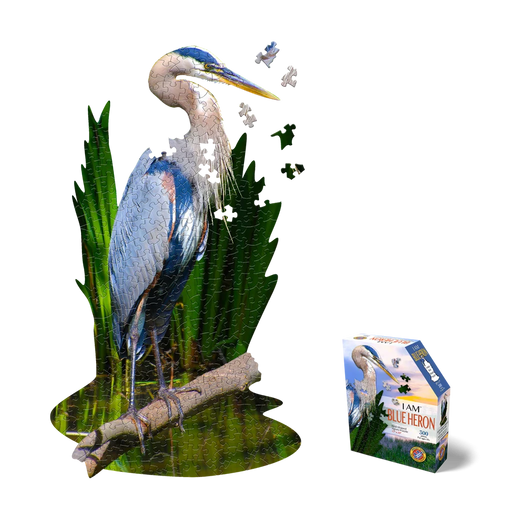 Jigsaw puzzle of a blue heron with greenery and packaging on a white background