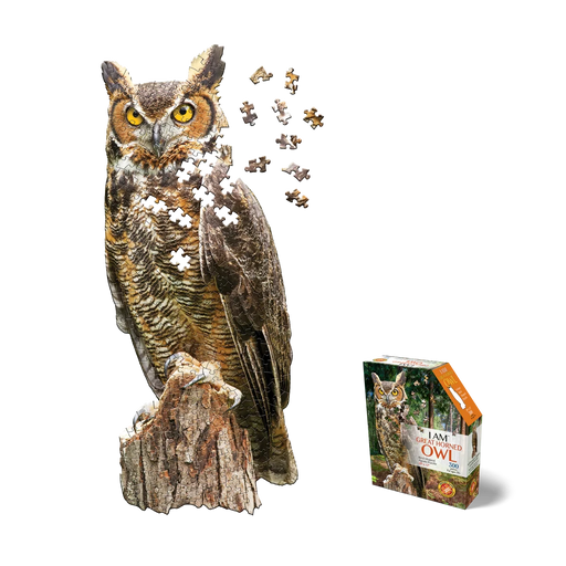 Partially assembled jigsaw puzzle featuring Great Horned Owl 