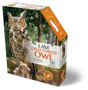 Jigsaw puzzle box featuring a great horned owl with a forest background