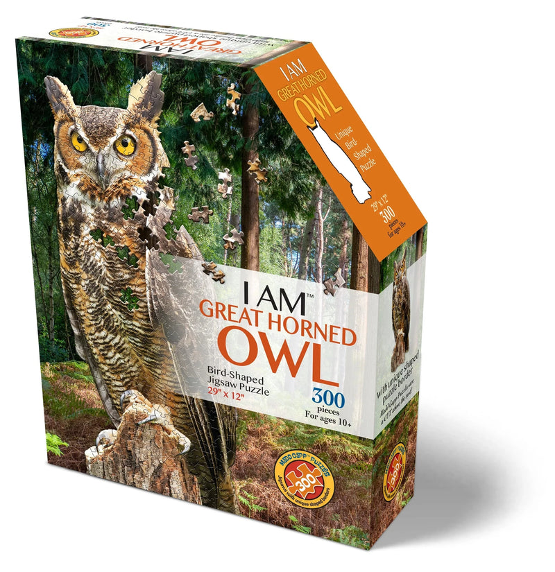 Jigsaw puzzle box featuring a great horned owl with a forest background