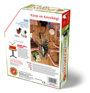 Puzzle box with 'Keep on Knocking!' text and images of family assembling a woodpecker puzzle.