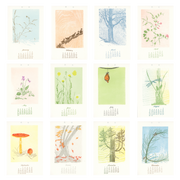 Calendar with illustrations of nature scenes on a white background