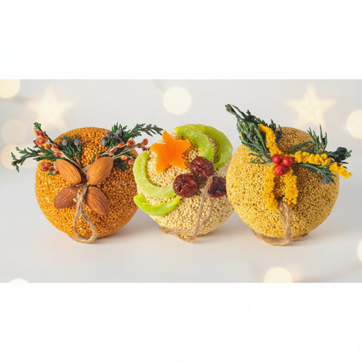 Option of three decorative balls with various toppings on a festive background