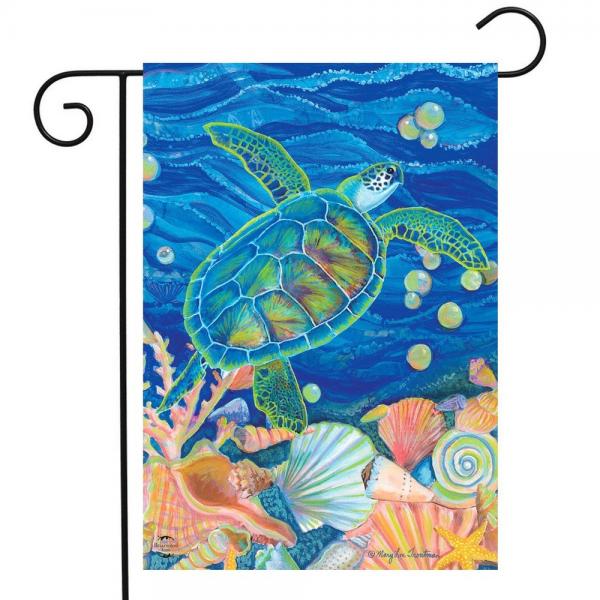 Decorative flag with a sea turtle and colorful shells on a blue ocean background