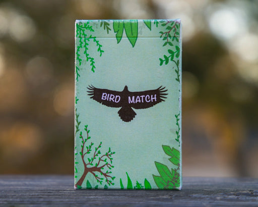 'Bird Match' memory card game packaging with a logo of eagle illustration on a green background