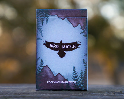 Cover of BirdMatch card game features a bird silhouette on a blue background