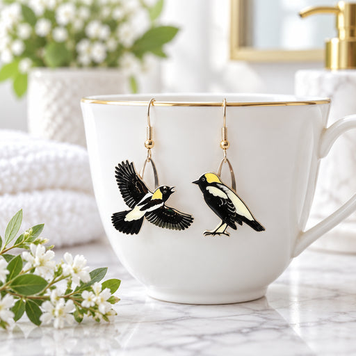 Bobolink Earrings with ruler for scale
