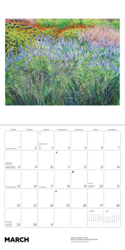 Calendar page with a scenic landscape and March calendar grid.