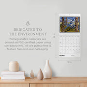 Pomegranate calendar displayed on a wall with environmental information text.