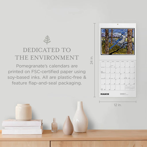 Pomegranate calendar displayed on a wall with environmental information text.