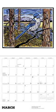 Calendar page for March with a bluebird illustration and mountain landscape.