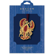 Beacon Design lobster ornament packaging in a blue display box on a white background