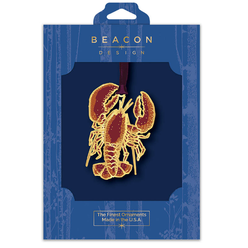Beacon Design lobster ornament packaging in a blue display box on a white background