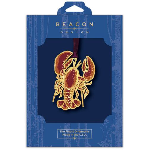 Beacon Design lobster ornament packaging in a blue display box on a white background