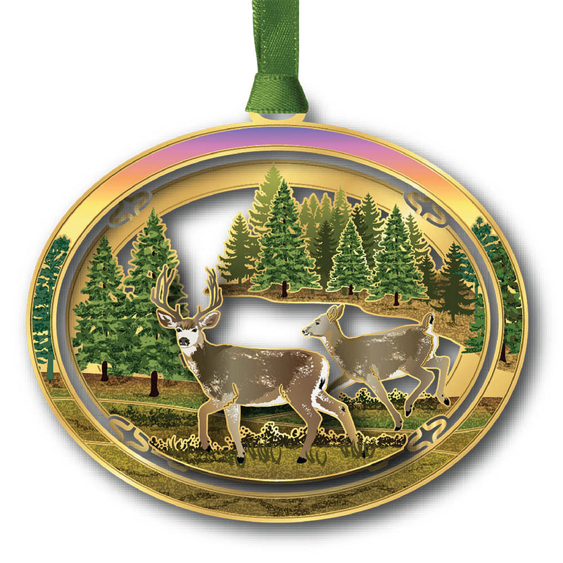 Decorative ornament with deer and forest design on a white background