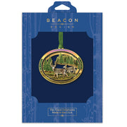 Gold deer ornament in Beacon Design packaging on a white background