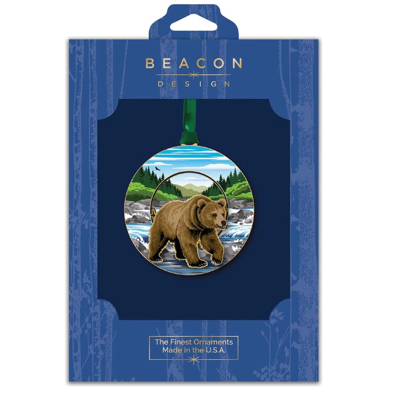Packaged ornament with grizzly bear design, featuring Beacon Design branding.