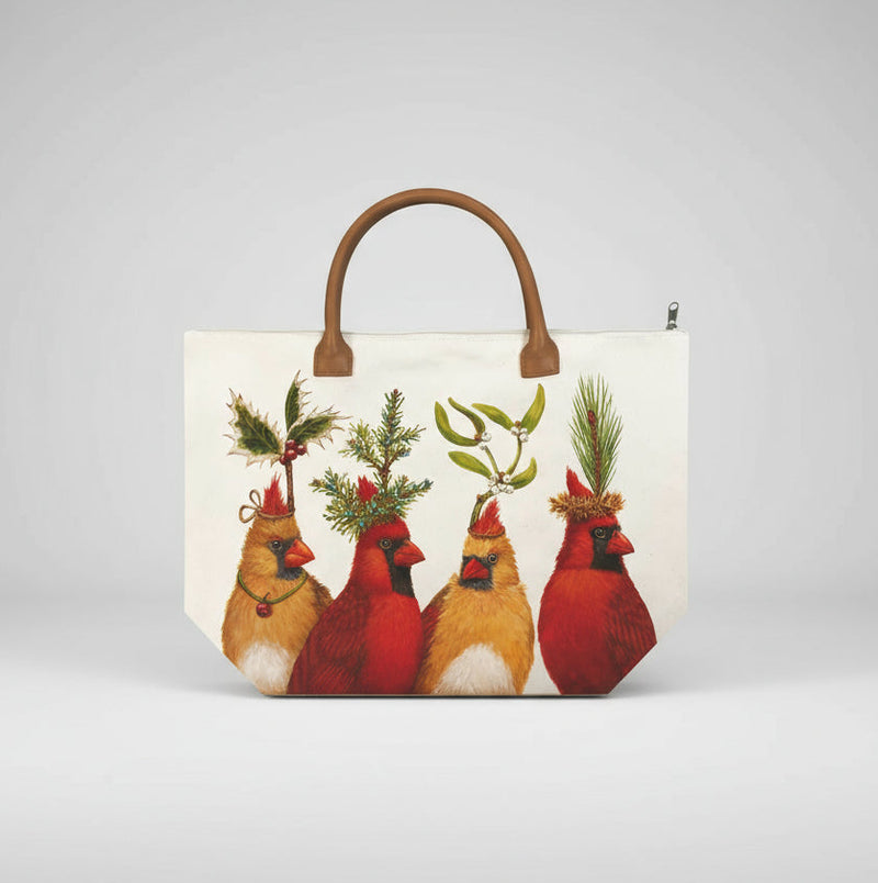 Cream colored tote with faux leather handles featuring four pairs of cardinals all wearing different sprigs of holiday greenery on their head.