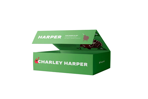Green puzzle box with 'Charley Harper' text on a white background