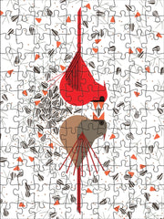 Jigsaw puzzle with a male and female cardinal artwork on a white background