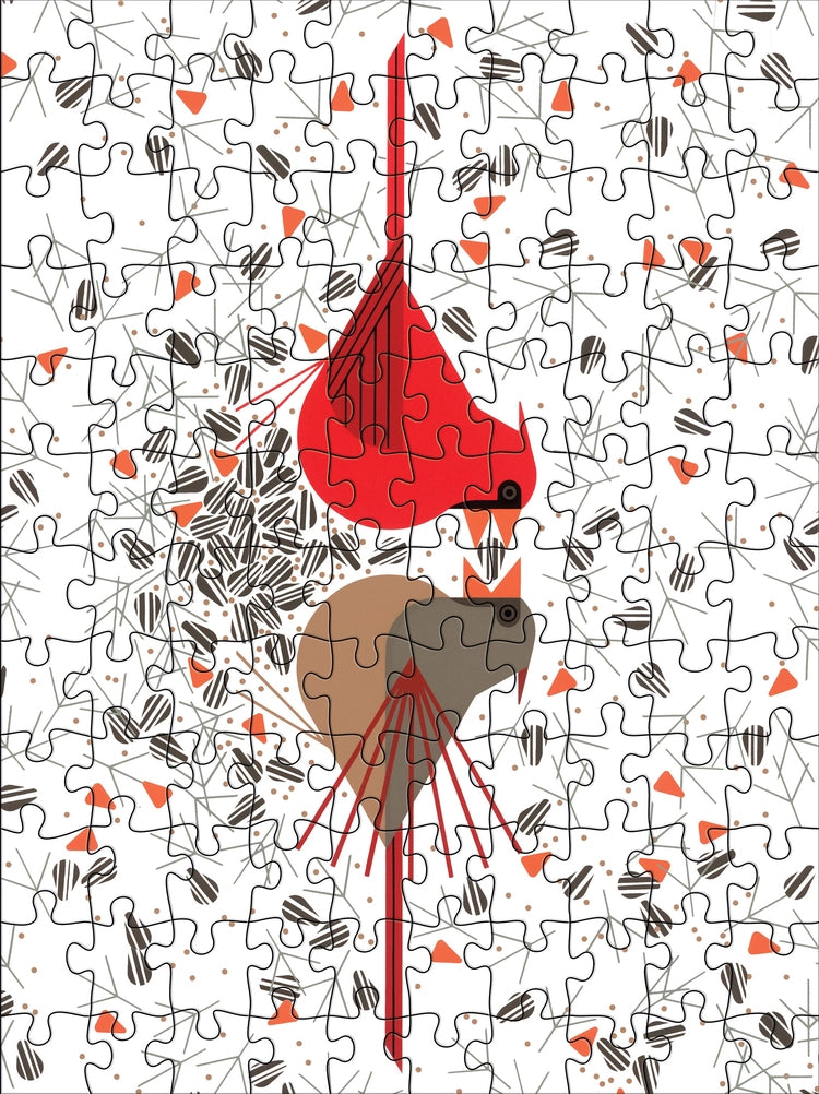 Jigsaw puzzle with a male and female cardinal artwork on a white background