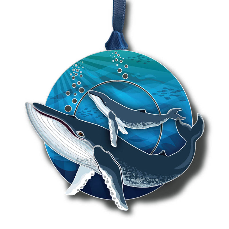 Decorative ornament with whale design on a blue background