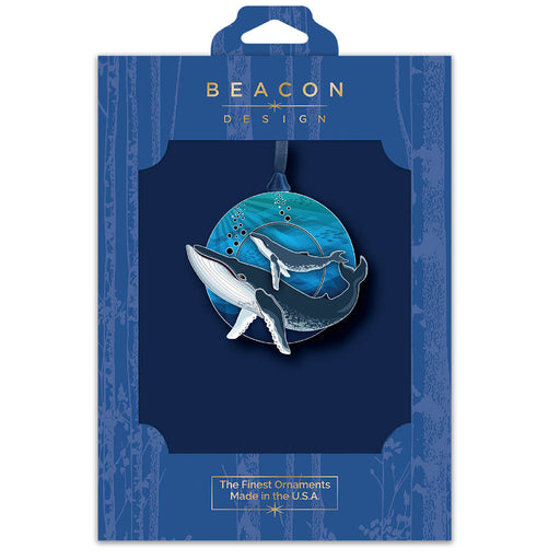 Humpback whale ornament in blue Beacon Design packaging on a white background