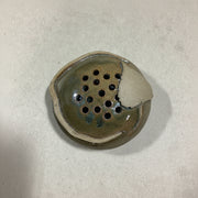 Ceramic incense holder cottonwood leaf design on a beige background