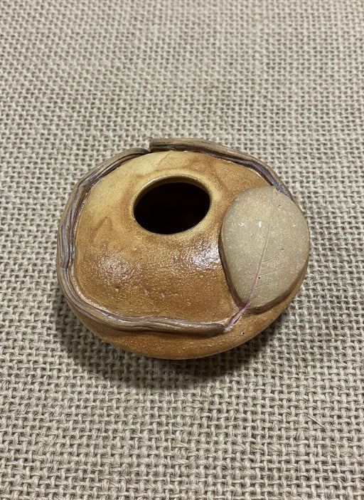 side/ top view of pillow vase