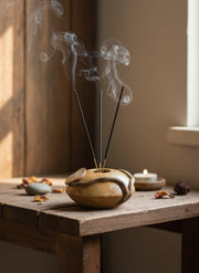 ceramic pillow vase in use with incense inside