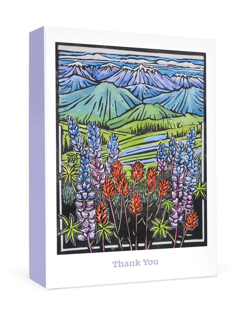 Boxed Thank You cards with mountain and flower design on a white background