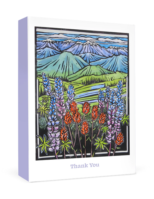 Boxed Thank You cards with mountain and flower design on a white background