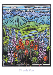 Card with colorful lupine flowers and mountain landscape, featuring the text 'Thank You'. Artist Molly Hashimoto.