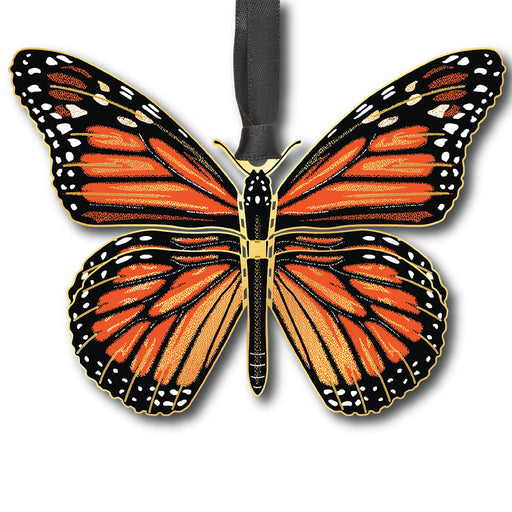 Butterfly-shaped ornament with orange and black wings on a white background