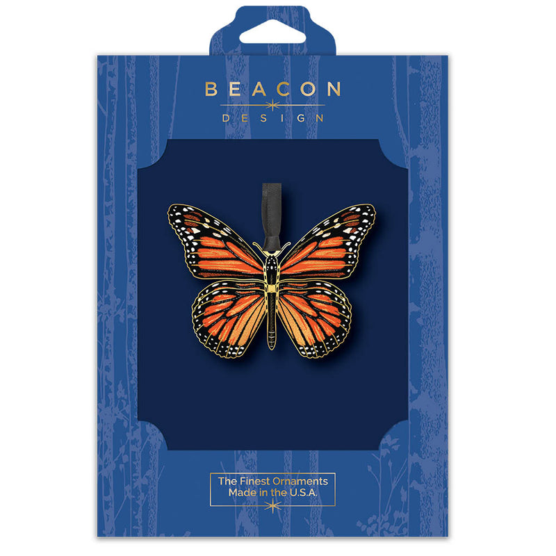 Monarch Butterfly ornament in blue Beacon Design packaging on a white background