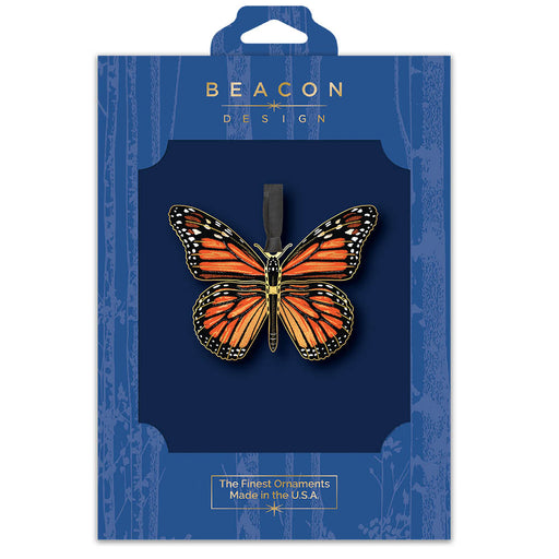 Monarch Butterfly ornament in blue Beacon Design packaging on a white background