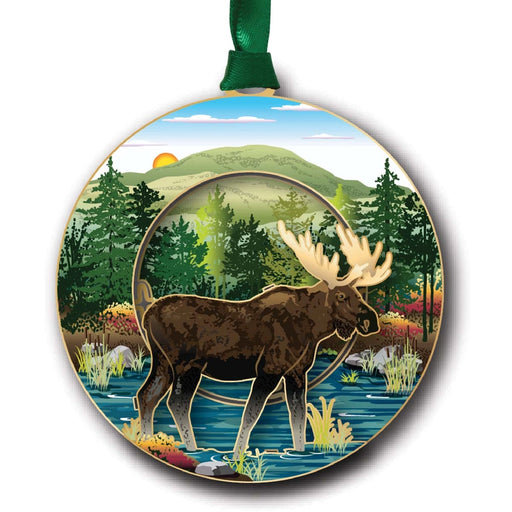 Decorative ornament with a moose and nature scene on a white background