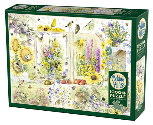 Cobble Hill puzzle box with nature-themed art featuring summer flowers, birds, and animals.