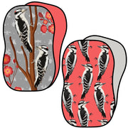 Two kitchen sponges with woodpecker design.