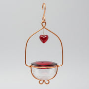 Tweet Heart Lantern Hummingbird feeder featuring a red glass heart pendant and copper fittings