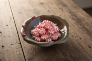 Stoneware Small Bowl - Common Winterberry filled with peppermint candies
