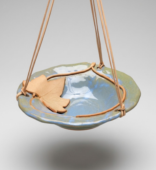 Hanging Bird Bath - Moonseed Vine Leaf Bowl
variation in glazing