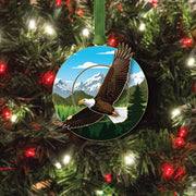 Decorative ornament with an eagle design on a Christmas tree.