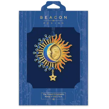 Sun and moon ornament design in blue Beacon Design packaging.